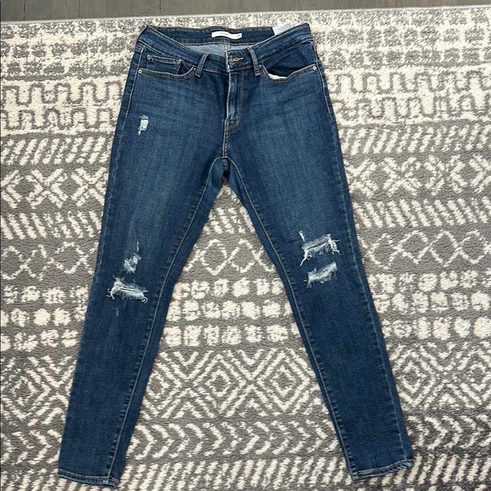 Women's Distressed Blue Jeans